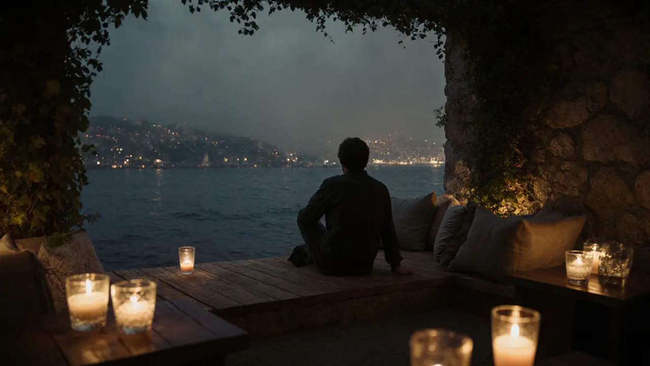 Hidden bar Leb-i Derya with candlelit tables by the water and mist rising from the Bosphorus.