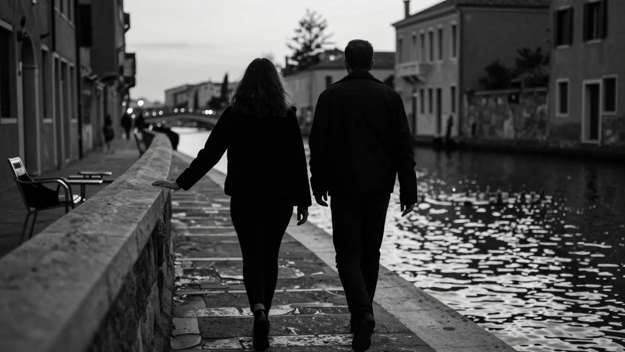 Two silhouettes walk in sync along the Navigli canal at sunset, sharing silent understanding.